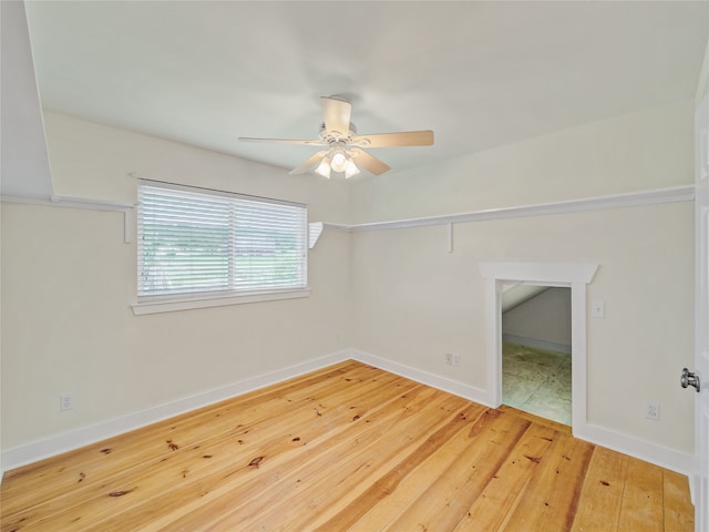 spare room with light hardwood / wood-style floors and ceiling fan