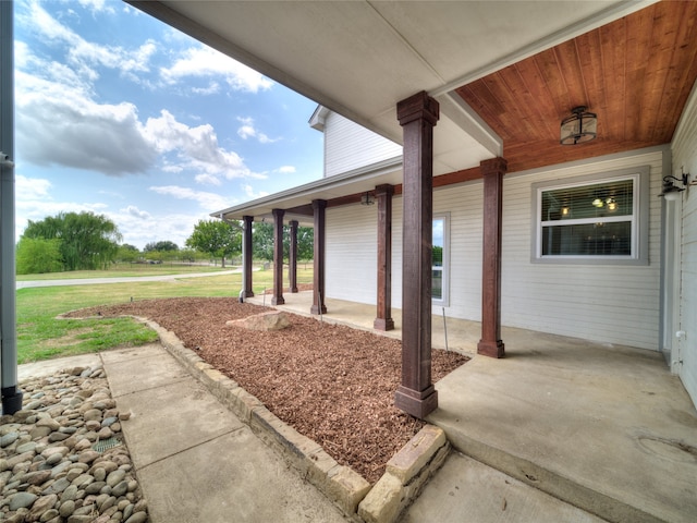 view of patio featuring a porch