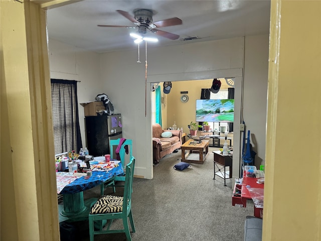 interior space featuring ceiling fan