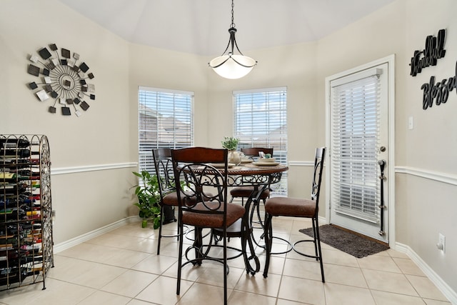 dining area featuring light tile patterned floors