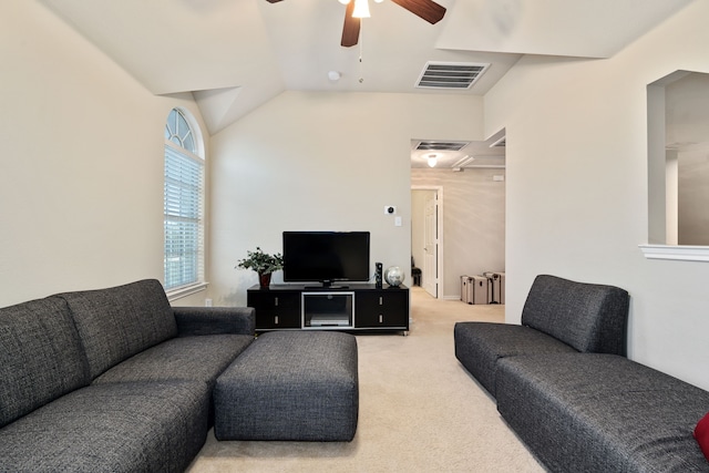 carpeted living room with lofted ceiling and ceiling fan