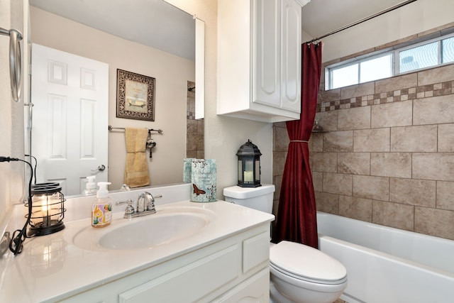 full bathroom featuring vanity, shower / tub combo with curtain, and toilet