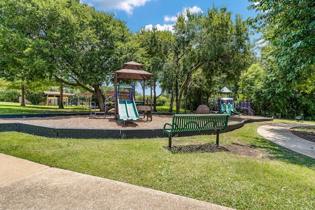 view of play area with a yard