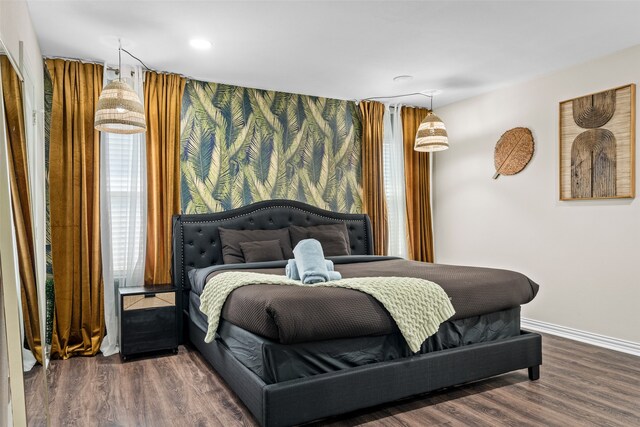 bedroom featuring dark wood-type flooring