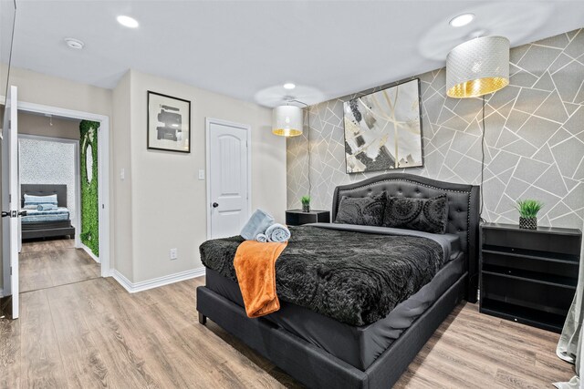 bedroom featuring hardwood / wood-style flooring