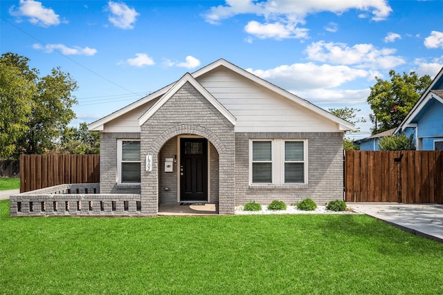 view of front of house with a front lawn