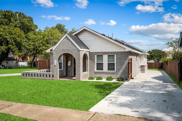 view of front of home with a front lawn