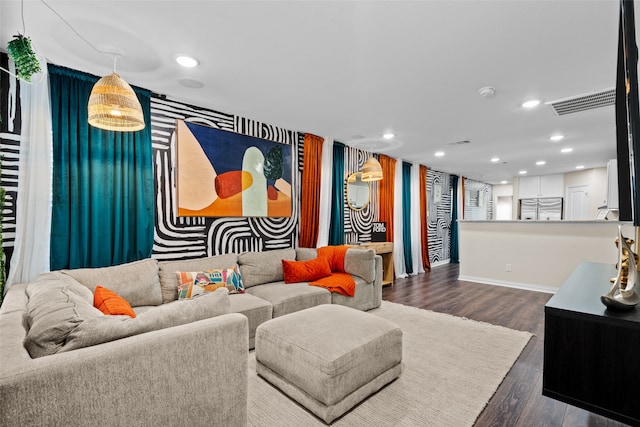 living room featuring dark wood-type flooring