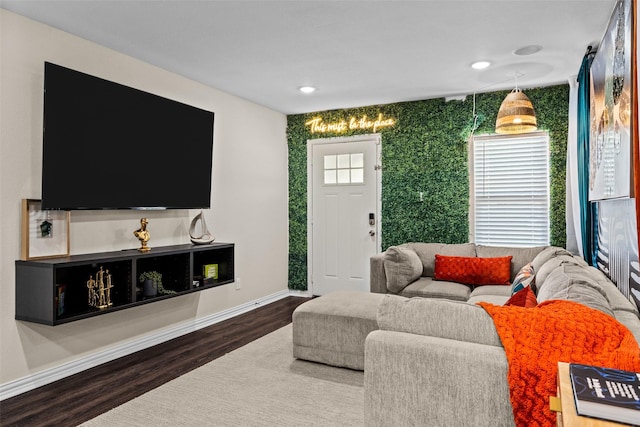 living room featuring dark wood-type flooring