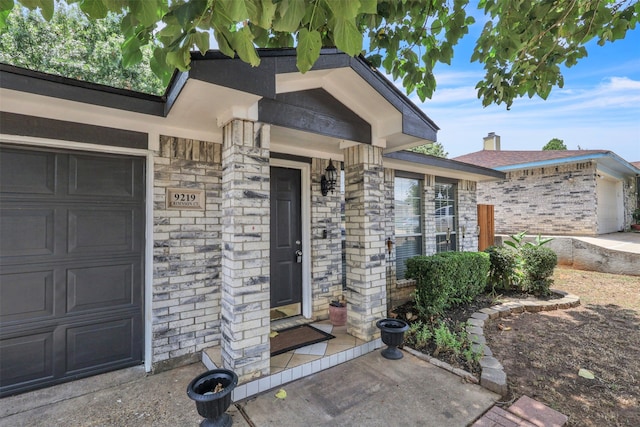 property entrance featuring a garage