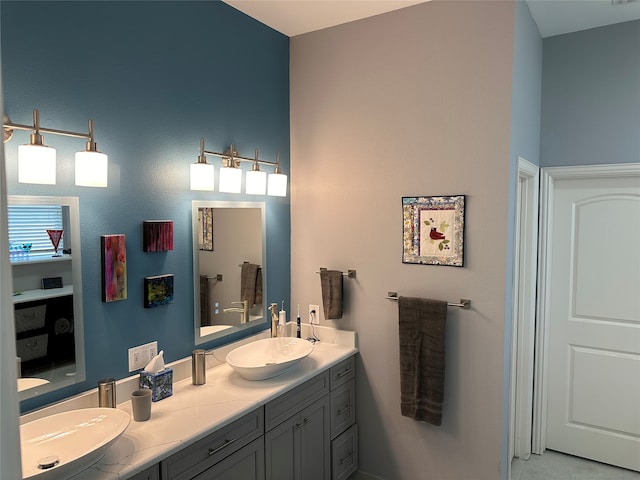 bathroom with dual bowl vanity