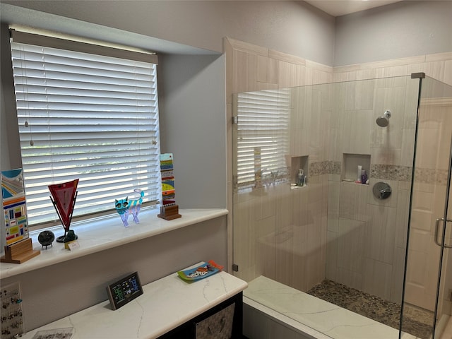 bathroom with an enclosed shower