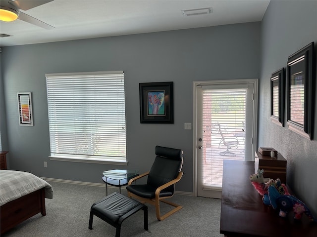 bedroom featuring ceiling fan, access to exterior, and carpet flooring