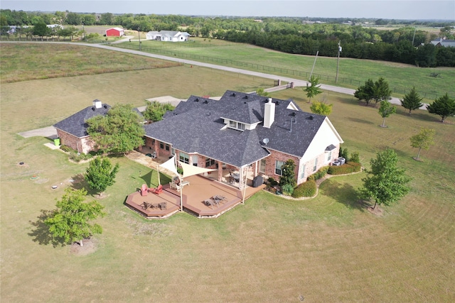 birds eye view of property featuring a rural view