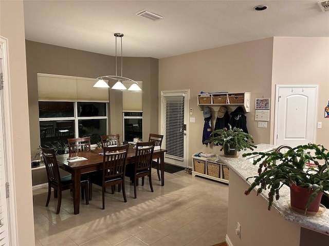 dining room featuring light tile patterned floors