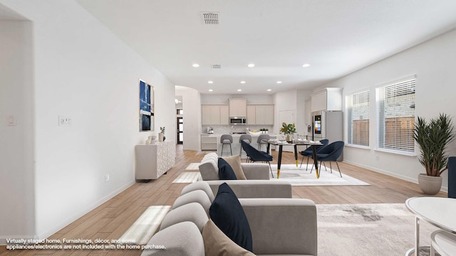 living room featuring light wood-type flooring