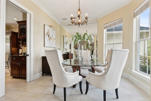 tiled dining space with an inviting chandelier, crown molding, and a healthy amount of sunlight