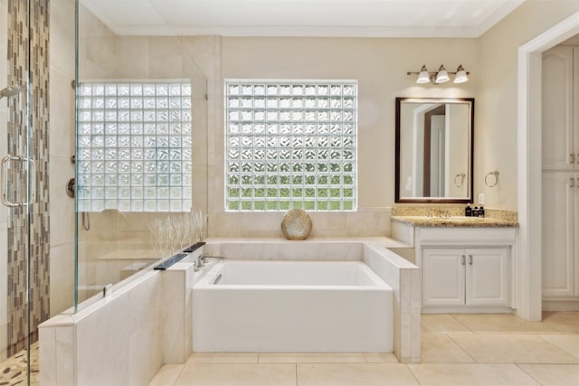 bathroom featuring ornamental molding, vanity, tile patterned floors, and separate shower and tub