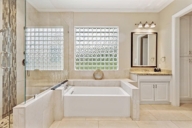 649 Oak Tree Cv, Cedar Hill, TX 75104 - bathroom with a bath, a shower stall, tile patterned flooring, and ornamental molding