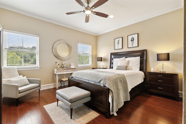 bedroom with dark wood-type flooring, ceiling fan, and ornamental molding