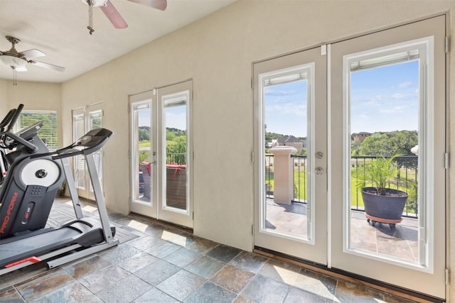 649 Oak Tree Cv, Cedar Hill, TX 75104 - exercise area with a ceiling fan, stone tile floors, and french doors