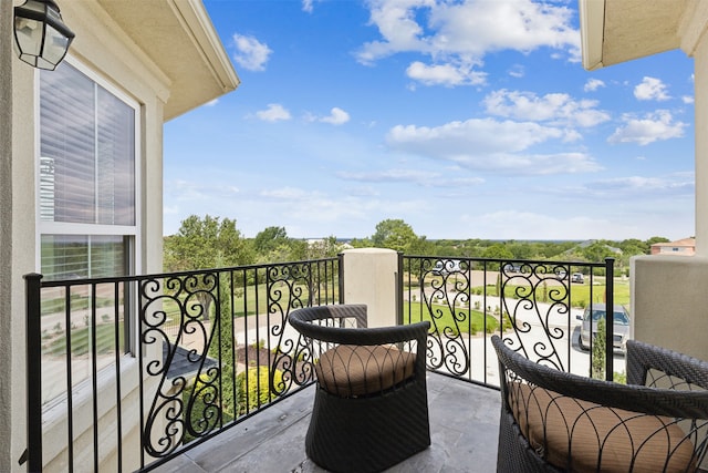 balcony featuring area for grilling