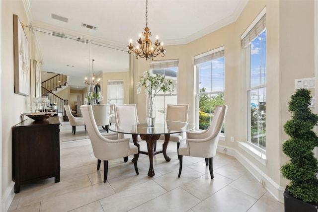 649 Oak Tree Cv, Cedar Hill, TX 75104 - dining area featuring a chandelier, baseboards, crown molding, and light tile patterned flooring