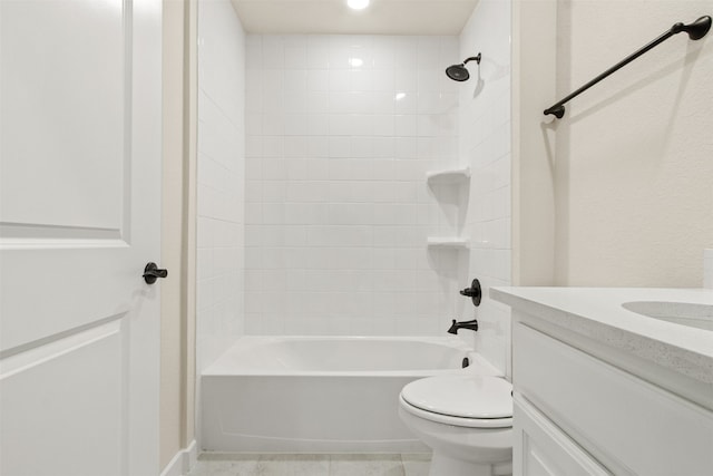 full bathroom with vanity, toilet, tiled shower / bath combo, and tile patterned flooring