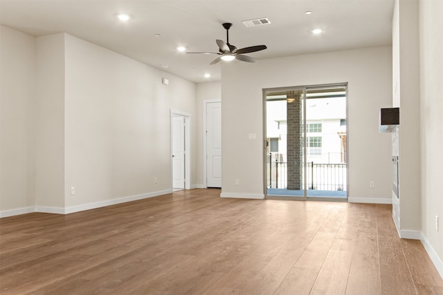 unfurnished room featuring wood-type flooring and ceiling fan