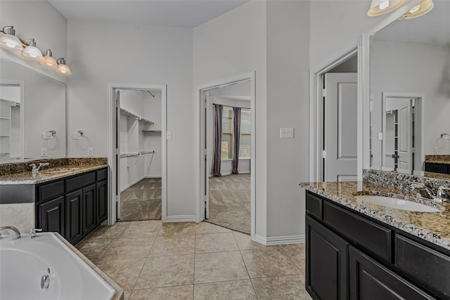 bathroom with vanity and tile patterned floors