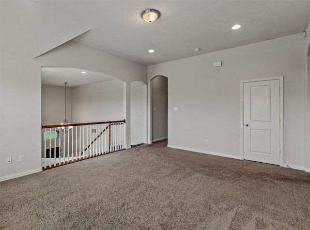 unfurnished room with carpet