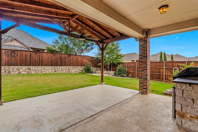 view of patio / terrace featuring ceiling fan