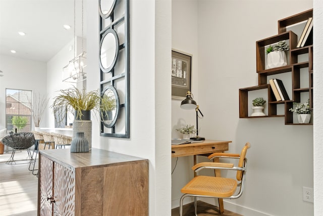 home office featuring hardwood / wood-style flooring