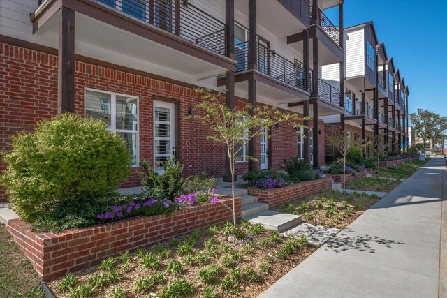 exterior space featuring a balcony