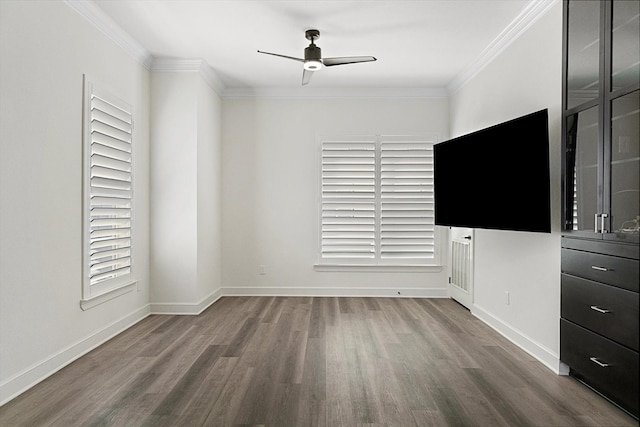 interior space with crown molding, ceiling fan, and hardwood / wood-style floors