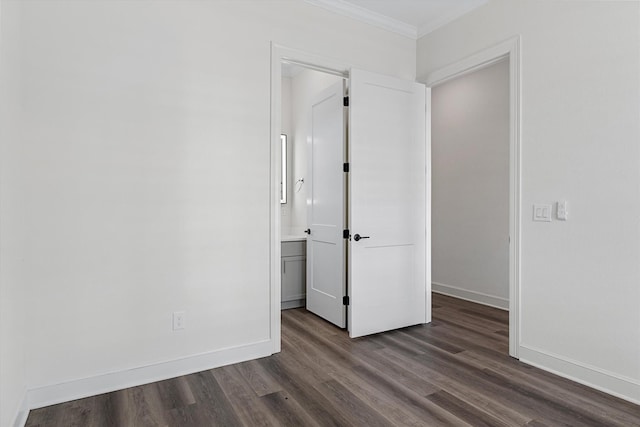 unfurnished bedroom with wood-type flooring and crown molding