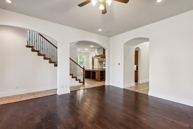 interior space with light hardwood / wood-style floors and ceiling fan