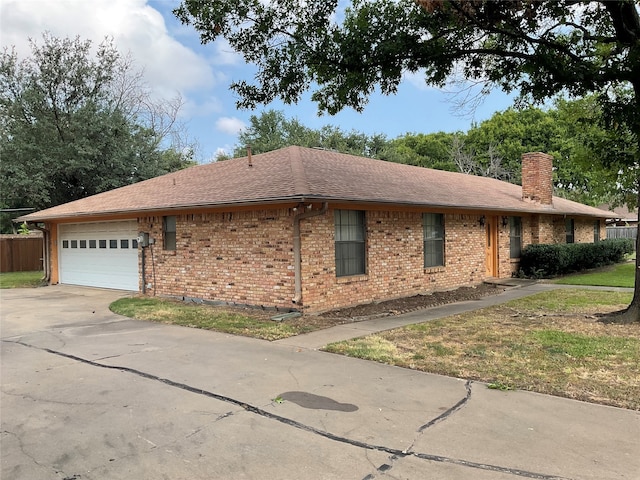 single story home with a garage