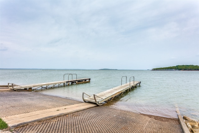 view of dock with a water view