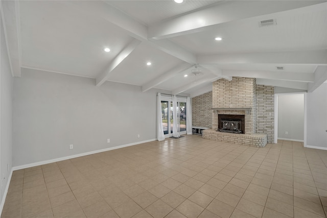 unfurnished living room with brick wall, vaulted ceiling with beams, a brick fireplace, and light tile patterned floors