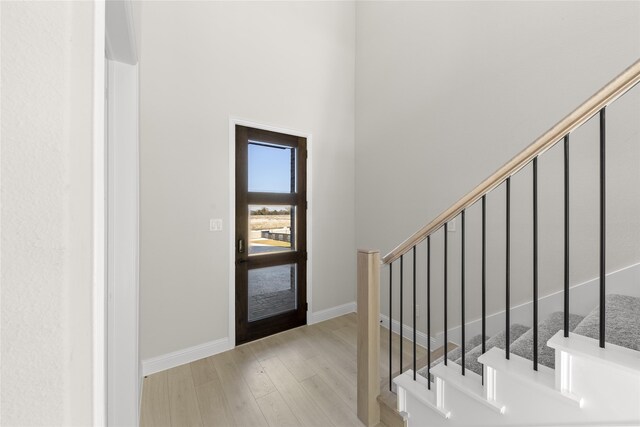 entryway with light hardwood / wood-style flooring