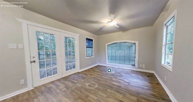 unfurnished room featuring dark hardwood / wood-style flooring and ceiling fan