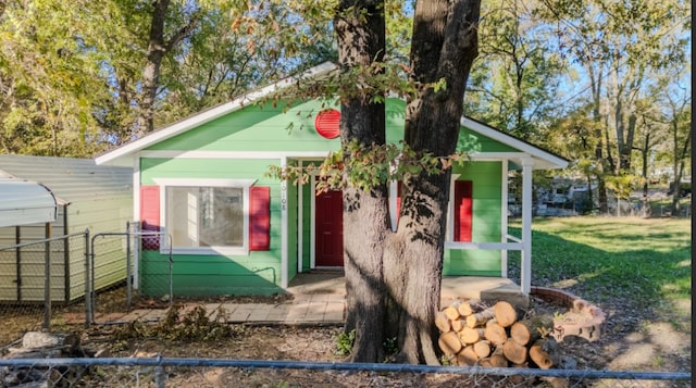 bungalow with a front lawn