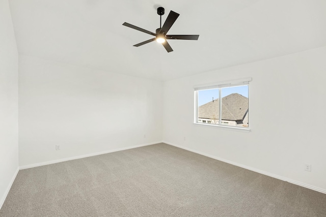 empty room featuring carpet floors and ceiling fan