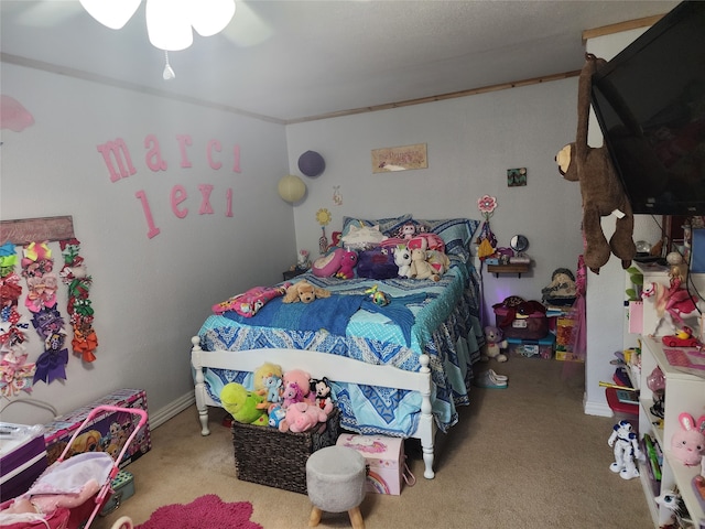 bedroom with light carpet and ceiling fan