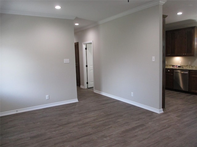 unfurnished room featuring crown molding and dark hardwood / wood-style flooring