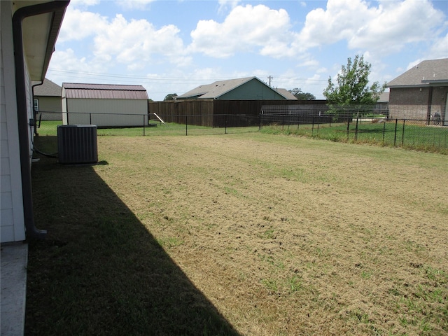 view of yard with central AC unit