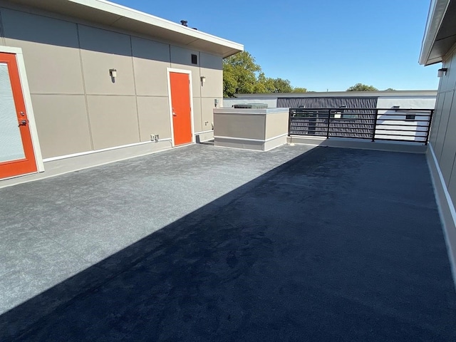 view of patio featuring a balcony