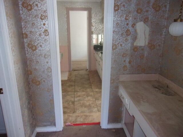 bathroom with vanity and tile patterned floors