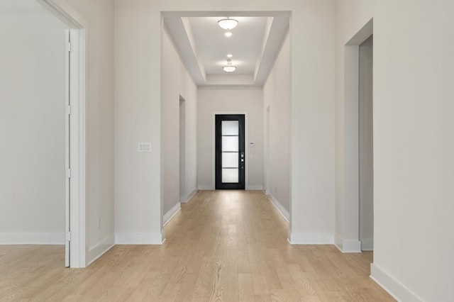 1417 Vermillion Dr, Prosper, TX 75078 - doorway to outside with baseboards and light wood-type flooring